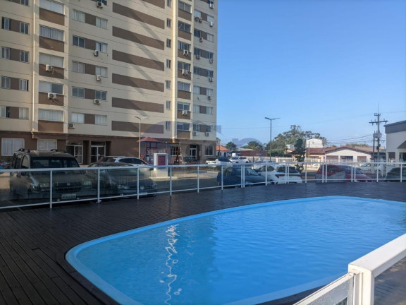 Imagem Apartamento com 2 Quartos à Venda, 59 m² em Igra Sul - Torres Imagem Apartamento com 2 Quartos à Venda, 59 m² em Igra Sul - Torres