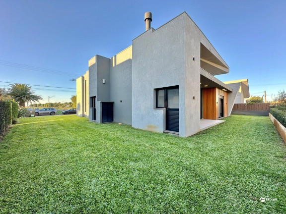 Imagem Casa de Condomínio com 4 Quartos à Venda, 235 m² em Atlântida Sul - Osório