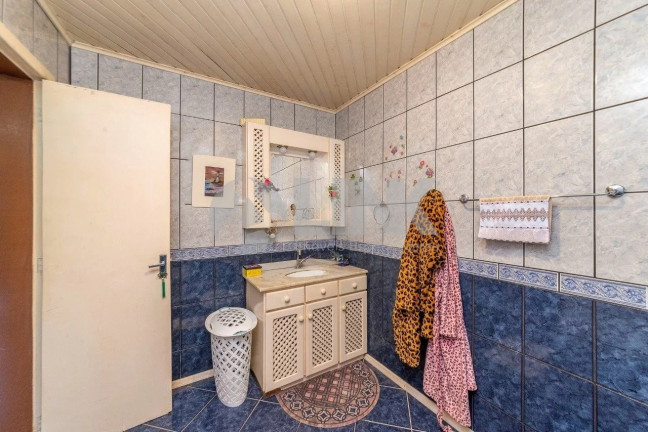 Imagem Casa com 4 Quartos à Venda, 299 m² em Santana - Porto Alegre