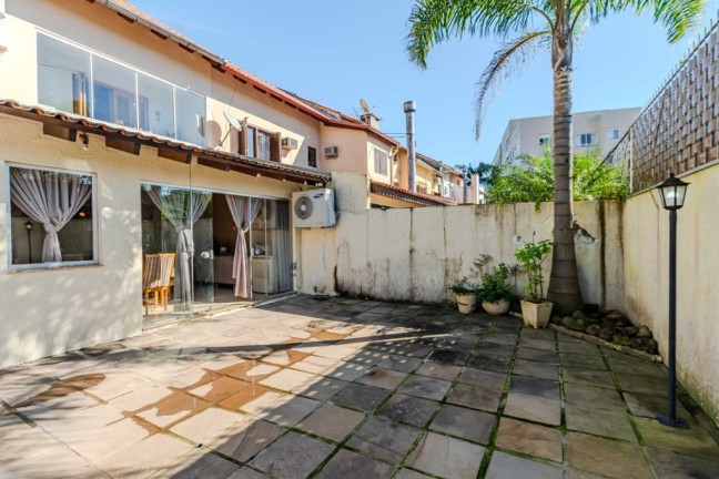 Imagem Casa com 4 Quartos à Venda, 202 m² em Ipanema - Porto Alegre