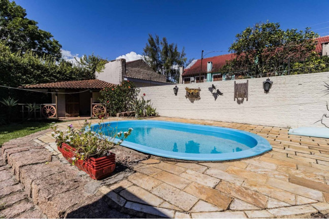 Imagem Casa com 3 Quartos à Venda, 235 m² em Guarujá - Porto Alegre Imagem Casa com 3 Quartos à Venda, 235 m² em Guarujá - Porto Alegre