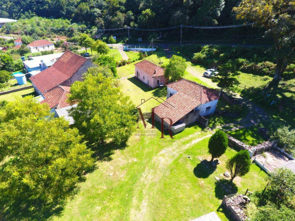 Imagem Casa com 6 Quartos à Venda, 755 m² em Belvedere - Morro Reuter