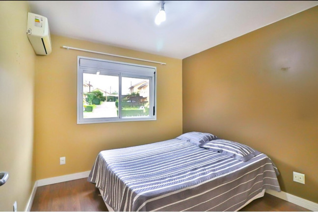 Imagem Casa de Condomínio com 3 Quartos à Venda, 230 m² em Mário Quintana - Porto Alegre