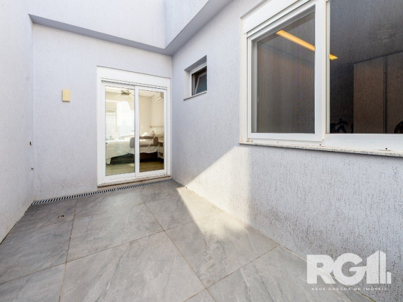 Imagem Casa com 3 Quartos à Venda, 400 m² em Três Figueiras - Porto Alegre