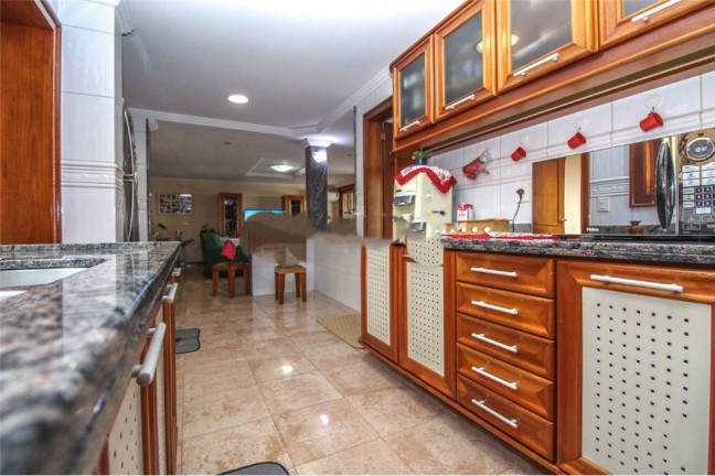 Imagem Casa com 3 Quartos à Venda, 608 m² em Medianeira - Porto Alegre Imagem Casa com 3 Quartos à Venda, 608 m² em Medianeira - Porto Alegre