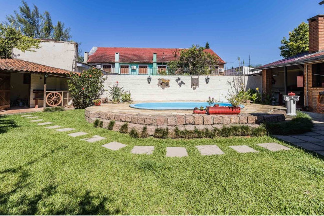 Imagem Casa com 3 Quartos à Venda, 235 m² em Guarujá - Porto Alegre Imagem Casa com 3 Quartos à Venda, 235 m² em Guarujá - Porto Alegre