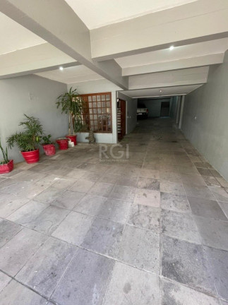 Imagem Casa com 4 Quartos à Venda, 480 m² em Santo Antônio - Porto Alegre