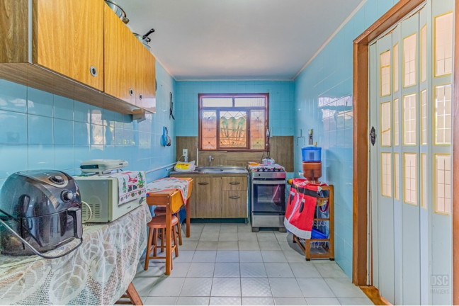 Imagem Casa com 5 Quartos à Venda, 131 m² em Cavalhada - Porto Alegre