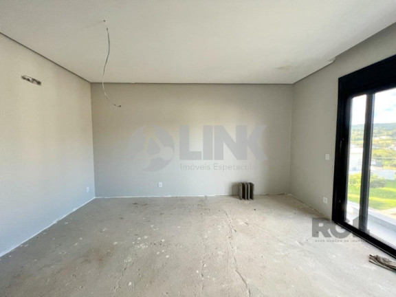 Imagem Imóvel com 4 Quartos à Venda, 371 m² em Vila Nova - Porto Alegre