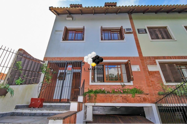 Imagem Casa com 3 Quartos à Venda, 231 m² em Ipanema - Porto Alegre
