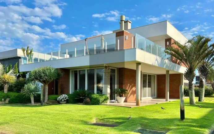 Imagem Casa de Condomínio com 4 Quartos à Venda,  em Xangri-lá