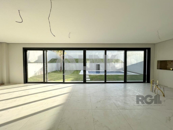 Imagem Imóvel com 4 Quartos à Venda, 371 m² em Vila Nova - Porto Alegre