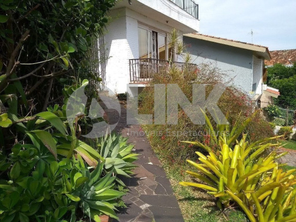 Imagem Casa com 6 Quartos à Venda, 574 m² em Menino Deus - Porto Alegre