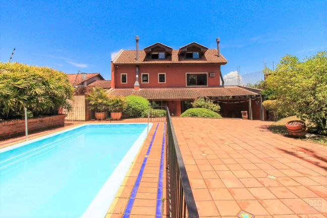 Imagem Casa com 4 Quartos à Venda, 334 m² em Ipanema - Porto Alegre