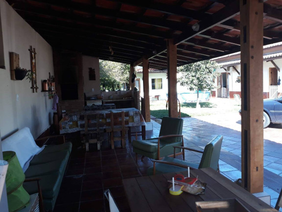 Imagem Casa com 4 Quartos à Venda, 640 m² em Balneário Califórnia - Caraguatatuba