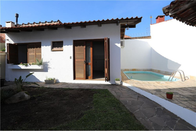 Imagem Casa com 5 Quartos à Venda,  em Jardim Itu - Porto Alegre
