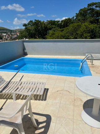 Imagem Casa com 4 Quartos à Venda, 480 m² em Santo Antônio - Porto Alegre