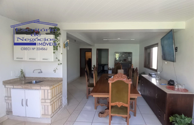 Imagem Casa com 4 Quartos à Venda, 260 m² em Vila Nova - Porto Alegre