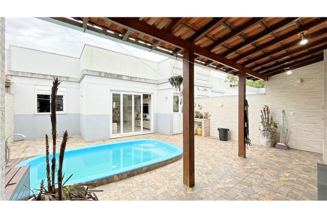 Imagem Casa de Condomínio com 3 Quartos à Venda, 78 m² em Lomba Do Pinheiro - Porto Alegre