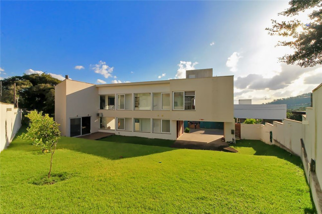 Imagem Casa com 4 Quartos à Venda, em Vila Nova - Porto Alegre Imagem Casa com 4 Quartos à Venda, em Vila Nova - Porto Alegre