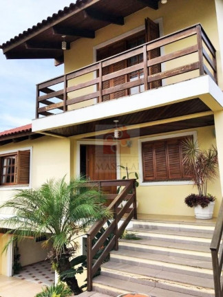 Imagem Casa com 3 Quartos à Venda, 280 m² em Agronomia - Porto Alegre