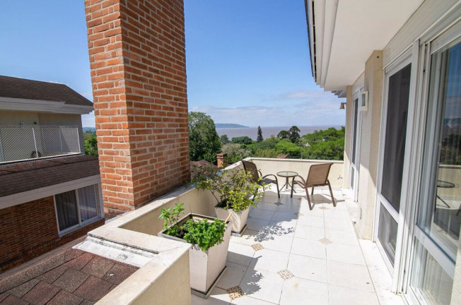 Imagem Casa de Condomínio com 4 Quartos à Venda, 477 m² em Pedra Redonda - Porto Alegre