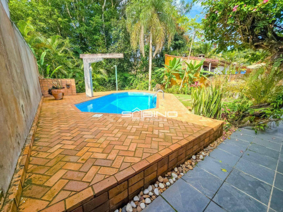 Imagem Casa com 6 Quartos à Venda, 288 m² em Riviera - Bertioga