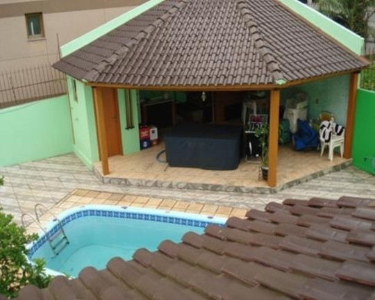 Imagem Casa com 4 Quartos à Venda, 305 m² em Jardim Planalto - Porto Alegre