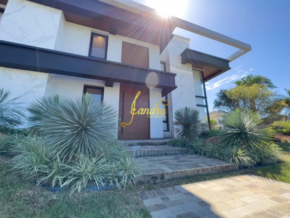 Imagem Casa de Condomínio com 6 Quartos à Venda, 588 m² em Zona Nova - Capão Da Canoa