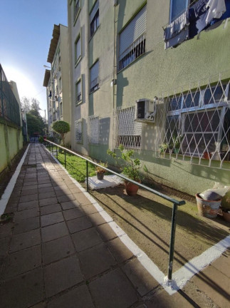 Imagem Imóvel com 2 Quartos à Venda, 66 m² em Vila Nova - Porto Alegre Imagem Imóvel com 2 Quartos à Venda, 66 m² em Vila Nova - Porto Alegre