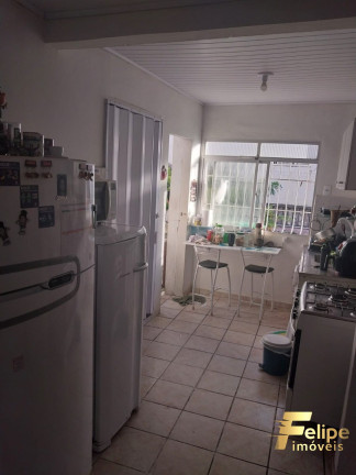 Imagem Casa com 4 Quartos à Venda, 450 m² em Centro - Guarapari