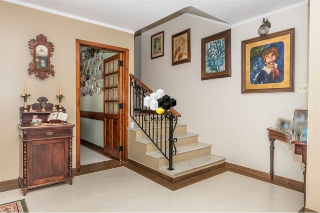 Imagem Casa com 4 Quartos à Venda, 525 m² em Jardim Sabará - Porto Alegre Imagem Casa com 4 Quartos à Venda, 525 m² em Jardim Sabará - Porto Alegre