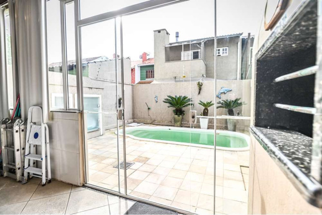 Imagem Casa com 3 Quartos à Venda, 152 m² em Hípica - Porto Alegre Imagem Casa com 3 Quartos à Venda, 152 m² em Hípica - Porto Alegre