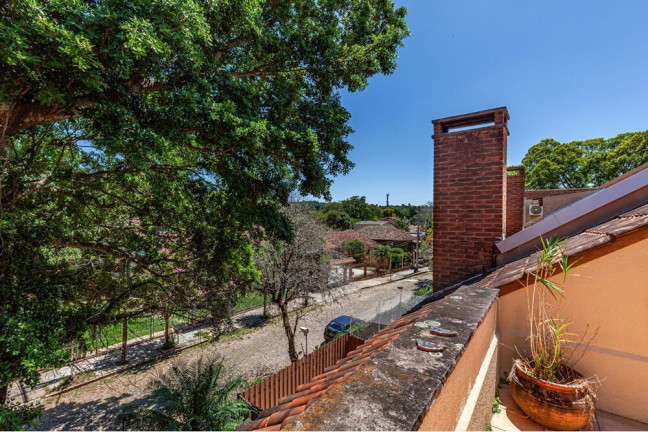 Imagem Casa de Condomínio com 3 Quartos à Venda, 205 m² em Ipanema - Porto Alegre