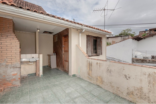 Imagem Casa com 4 Quartos à Venda, 170 m² em Vila Nova - Porto Alegre