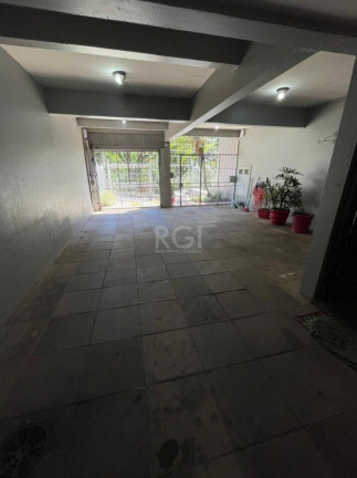 Imagem Casa com 4 Quartos à Venda, 480 m² em Santo Antônio - Porto Alegre