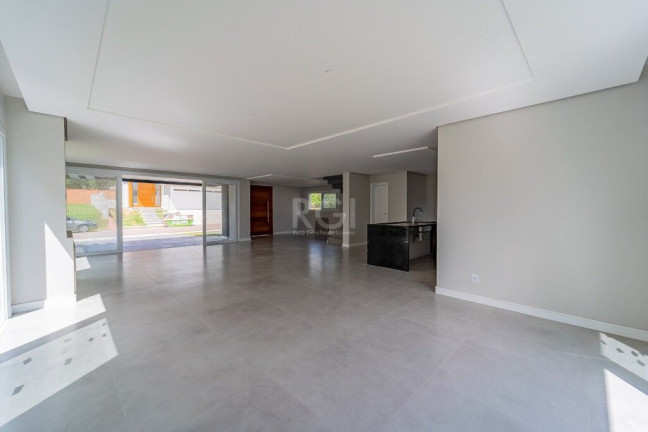 Imagem Casa de Condomínio com 3 Quartos à Venda, 300 m² em Vila Nova - Porto Alegre