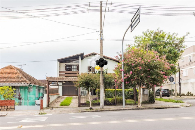 Imagem Casa com 4 Quartos à Venda, 313 m² em Cavalhada - Porto Alegre