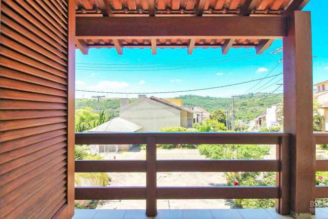 Imagem Casa de Condomínio com 3 Quartos à Venda, 389 m² em Vila Nova - Porto Alegre