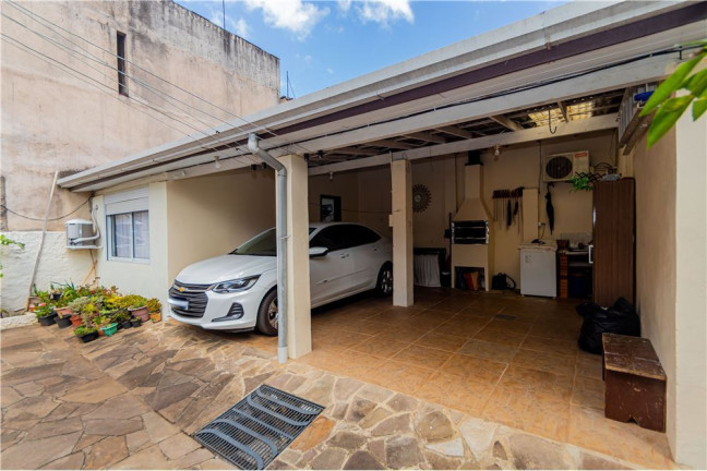 Imagem Casa com 3 Quartos à Venda, 139 m² em Santa Tereza - Porto Alegre