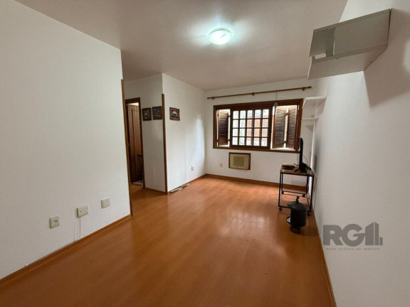 Imagem Apartamento com 1 Quarto à Venda, 42 m² em Jardim Botânico - Porto Alegre
