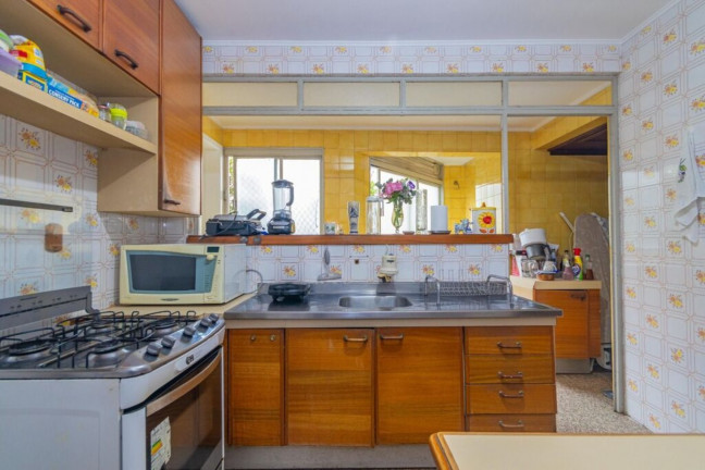 Imagem Imóvel com 3 Quartos à Venda, 104 m² em Auxiliadora - Porto Alegre