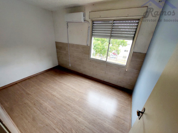 Imagem Imóvel com 2 Quartos à Venda, 50 m² em Vila Nova - Porto Alegre