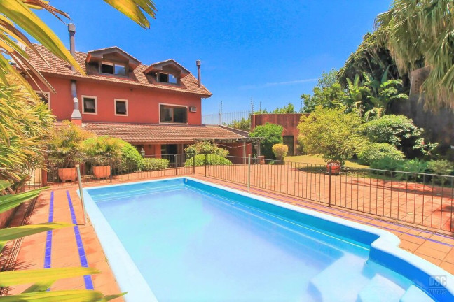 Imagem Casa com 4 Quartos à Venda, 334 m² em Ipanema - Porto Alegre
