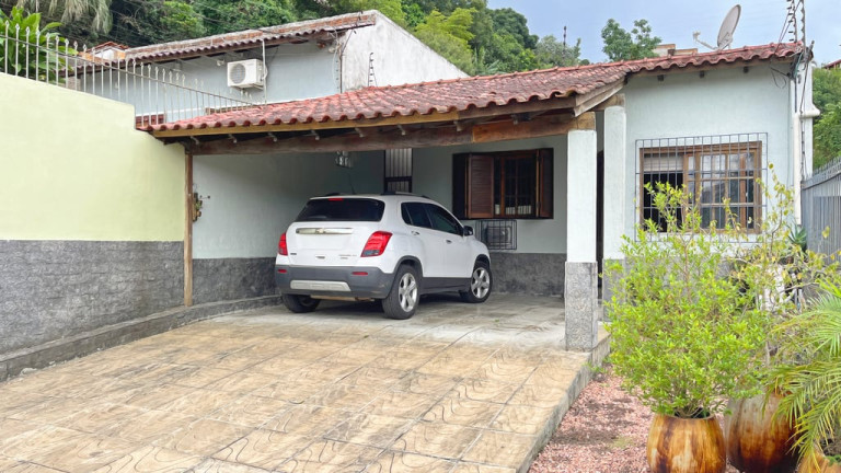Imagem Casa com 3 Quartos à Venda, 156 m² em Vila Nova - Porto Alegre