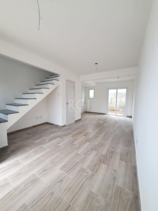 Imagem Casa de Condomínio com 2 Quartos à Venda, 64 m² em Vila Nova - Porto Alegre