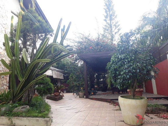 Imagem Casa com 4 Quartos à Venda, 317 m² em Centenário - Torres