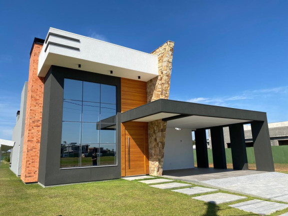 Imagem Casa com 3 Quartos à Venda, 237 m² em Torres - Torres Imagem Casa com 3 Quartos à Venda, 237 m² em Torres - Torres