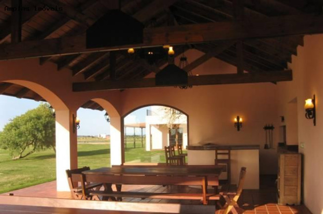 Imagem Imóvel com 4 Quartos à Venda, 1.000 m²