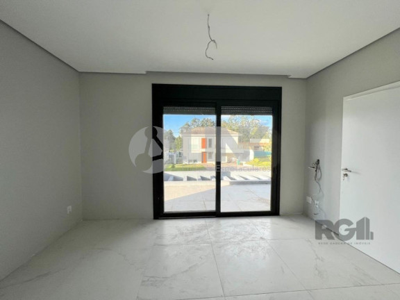 Imagem Imóvel com 4 Quartos à Venda, 371 m² em Vila Nova - Porto Alegre
